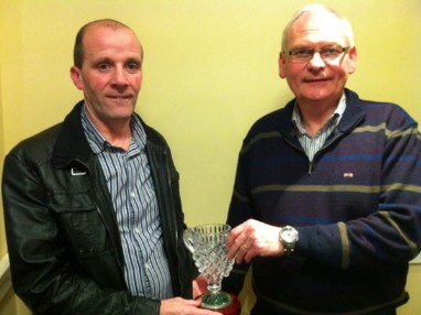 Pat Mc Guinness accepting Marshal of the Year award from Club President Tom Walsh